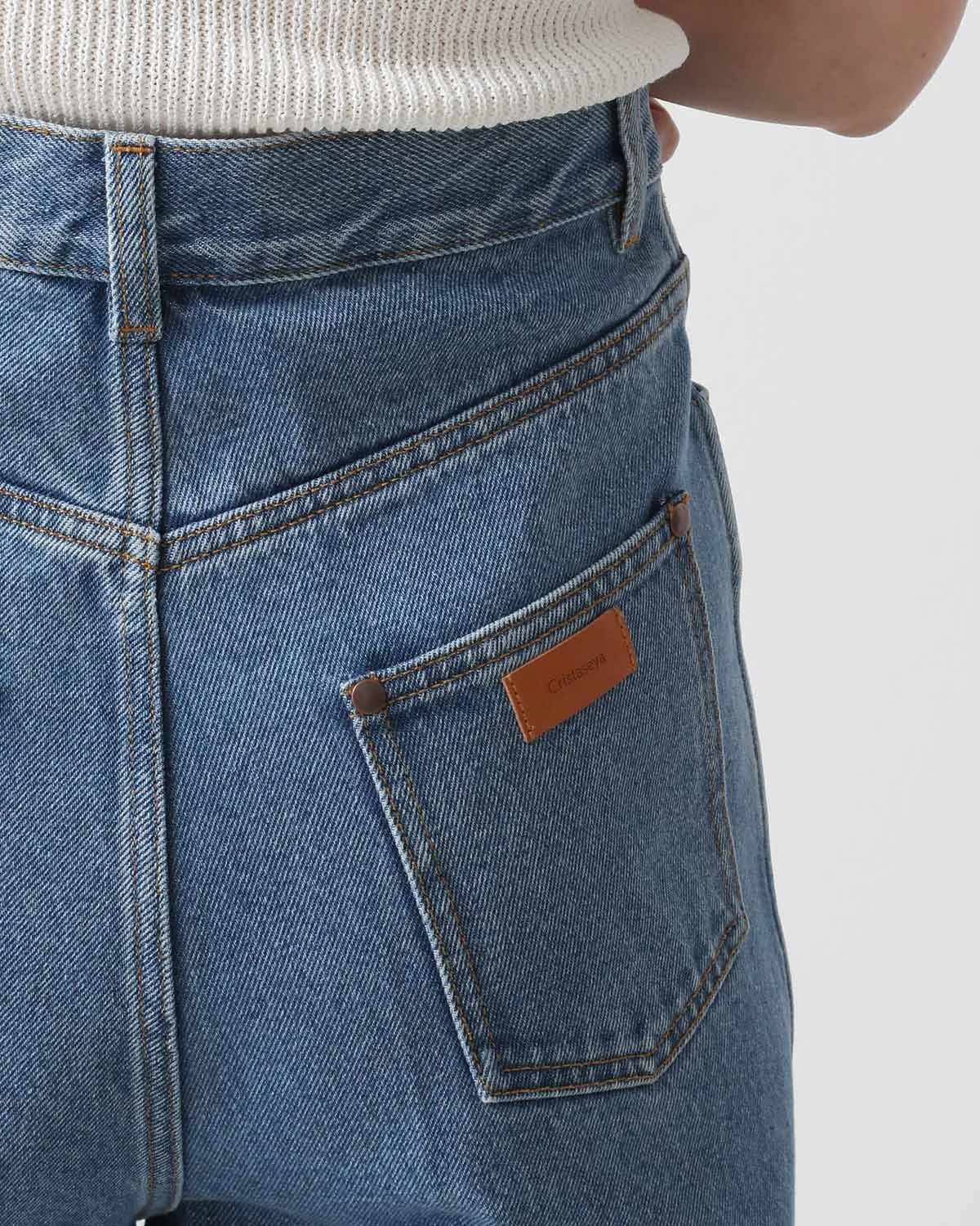 BLEACHED DENIM HIGH- WAISTED JEANS